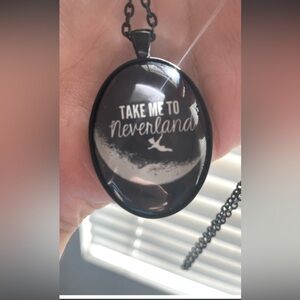 Black take me to Neverland necklace. Inspired by Peter Pan. New in package